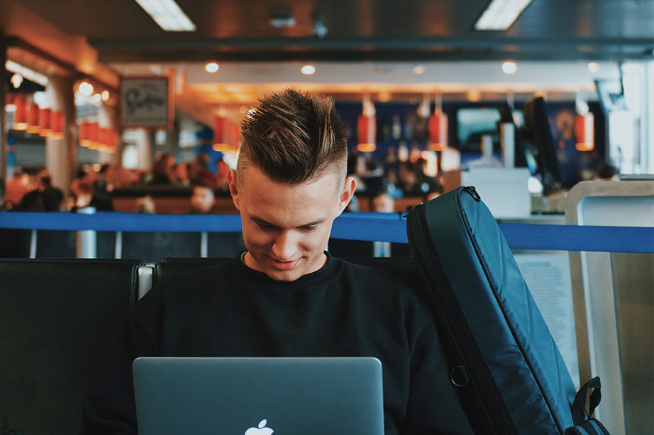 young man waiting at airport